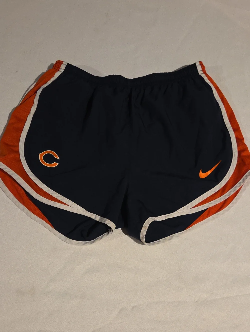 Nike Women’s Navy Athletic Shorts with Orange and White Trim